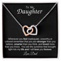 Interlocking Heart Necklace on Black Background (Yellow and White Gold Variant)