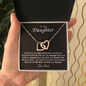 Interlocking Heart Necklace on Black Background (Yellow and White Gold Variant)