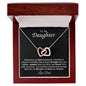 Interlocking Heart Necklace on Black Background (Yellow and White Gold Variant)